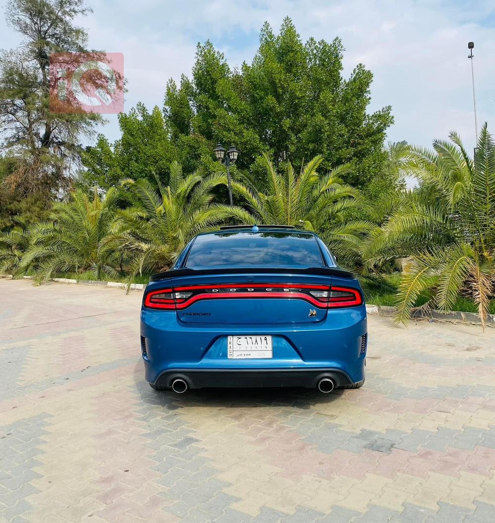 دۆج چارجەر